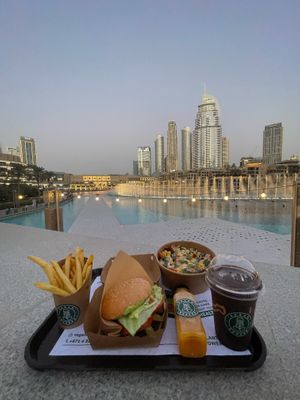 Nothing better than a burger date in front of the fountains :) at Vegan Burger - Dubai Mall in Dubai