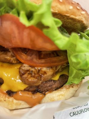 Plant-based meat patty, tempeh, vegan cheese  at Vegan Burger - Dubai Mall in Dubai
