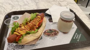 Hotdog sandwich with additional veg and cheese and Side Dessert   at Vegan Burger - Dubai Mall in Dubai