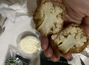 O Wow 🤩 I can’t believe how thin & crispy the outside layer batter is!   at Vegan Burger - Dubai Mall in Dubai