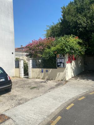 Back entrance to Le Parvis. Goes straight onto the garden and terrace. Wheelchair access through this entrance. Also opposite a large car park. at Le Parvis in Saintes