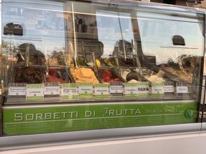 Every tag with the “v” on it marks a vegan flavor, the green ones are from natural fruit and the brown ones are made with rice milk   at Gelateria Cioccolateria Floriana in Milan