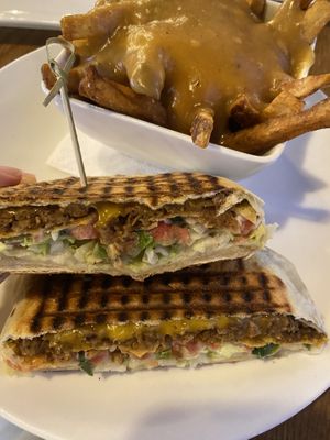 Crunchwrap with poutine   at Pure Kitchen - Rideau St in Ottawa