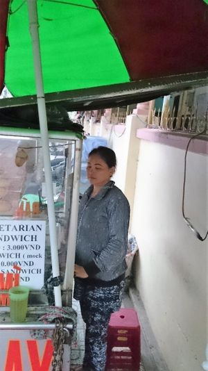 Preparing the Vegetarian Baguette at Chay Banh Mi - Food Cart in Nha Trang
