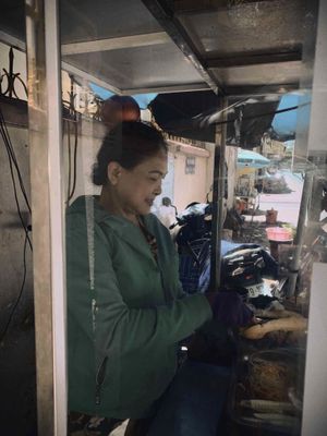 Loveliest seller at Chay Banh Mi - Food Cart in Nha Trang
