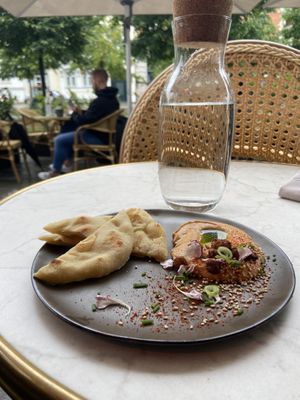 Hummus with naan 🫓   at Bistro Verde in Copenhagen