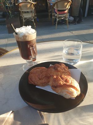 Irish coffee and a croissant at Bistro Verde in Copenhagen