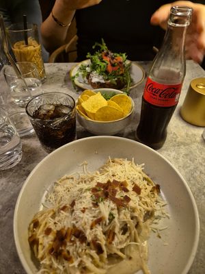 Carbonara, nachos and guac + salmon side at Bistro Verde in Copenhagen