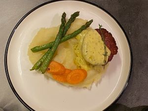 "Juicy marbles steak," with asparagus and carmelized carrots, on mashed potatoes with bearnaise. (Tasted better than this photo looks, sorry) at Bistro Verde in Copenhagen