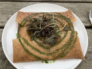 Pancake with onion compote, grilled peppers and artichoke - very good and tasty!   at Kesses Hus in Klitmoeller