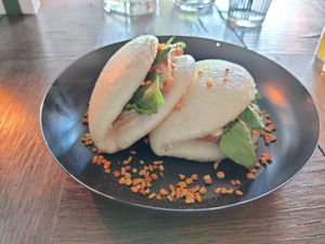 Inari bao - bao with Inari amped tofu and tom kha peanut sauce at MIRZAM COCKTAIL BAR in Gdansk