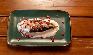 Aubergine - eggplant, walnuts, garlic, pomegranate at Dze Best Cafe & Restaurant in Brasov