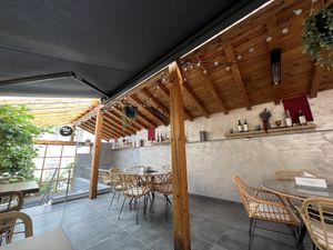 The indoor seating upstairs (but with some pen windows in warmer weather)   at Dze Best Cafe & Restaurant in Brasov