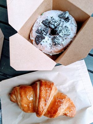 Croissant and cookies n creme donut at Clementine Bakery in Brooklyn