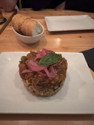 Caponata with couscous and pickled onions   at Entre Hores in Barcelona