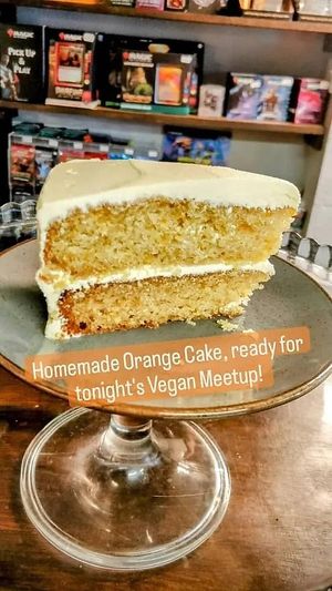Michelle's lovely looking vegan orange cake :-) at d20 Board Game Cafe - Uxbridge in Uxbridge