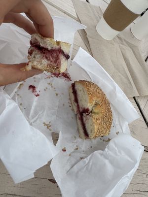 Sesame seed bagel with berry jam.  at Bagel Hound in Wellfleet