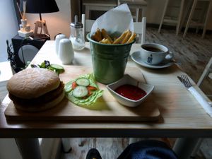 Burger with patatas at Bean and Gone Cafe in 