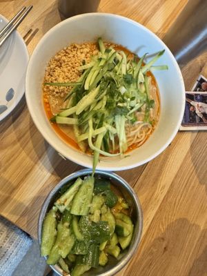 Dan Dan Noodles and cucumber salad  at Pine & Crane in Los Angeles