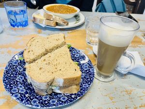 ‘Tuna Mayo’ sándwich’ oat latte 😋😋  at The Pack Horse Cafe in Bridport