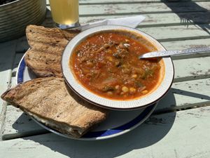 Tomato chickpea stew with vegan cheese toastieng  at The Pack Horse Cafe in Bridport