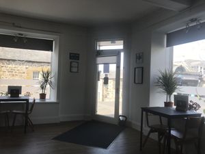 Some seating here and more in the dining room    at The New Denver in Cullen