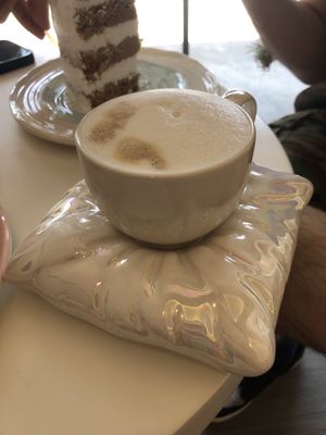 Oat milk cappuccino   at Delcie's Desserts and Cakes in Central Singapore