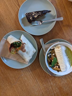 Snickers cake, matcha bowl, and vegan wrap at Funk You Natural Food in Berlin