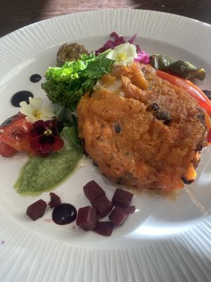 Sweet potato, white bean and vegan feta cake   at Poacher Restaurant in Ballina