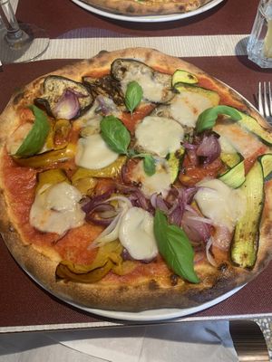 Pizza verdura switched with self made vegan mozzarella   at 128 in Vittorio Veneto