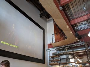 The movie screen and upper seating area. at The Delft Bistro in Marquette