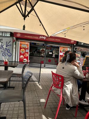Seating outside - a bit noisy as there is a freeway beside.   at Siraj Shawarma in Santiago