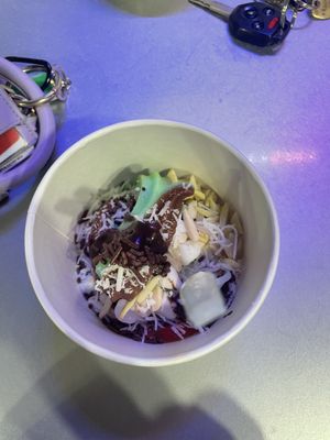 Mint and chocolate almond froyo with sprinkles, mochi, almonds, coconut, sugar free chocolate syrup   at TCBY in Fort Collins
