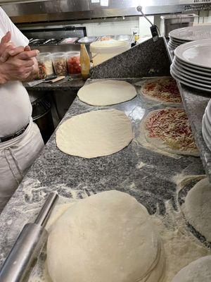 Italian pizza baker at his work  at Ristorante Toscanini in Cologne