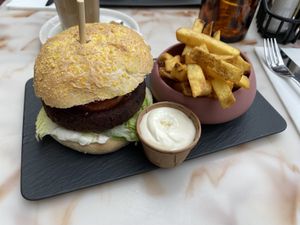 Happea burger with fries and vegan mayo  at STAN & CO in The Hague