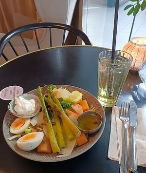 Seasonal asparagus salad with passion fruit Italian soda. at Bakery Miriam  in Jyvaeskylae