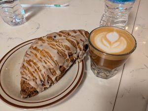 Pistachio chocolate scone with macadamia nut cortado at Rowan Coffee in Asheville