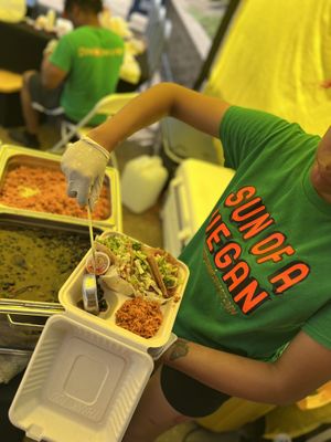 Taco Trio plate featuring three cheese corn tortilla shells served with house made Mexican rice and black beans  at Sun Of A Vegan in Memphis