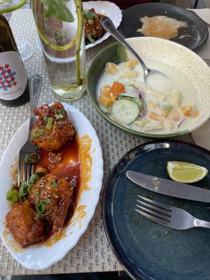 Korean fried cauliflower and ceviche (was taken in the middle of dinner 😅)  at Espécie in Porto