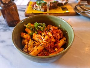 Tteok with shiitake and peanuts. at Espécie in Porto