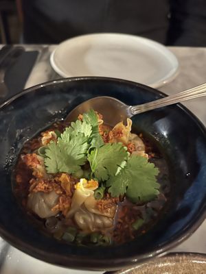Chestnut and mushroom dumplings in chilli oil  at Espécie in Porto