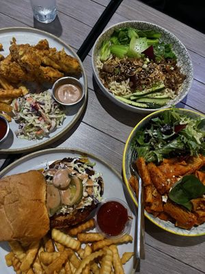 Hot chicken sandwich/ chicken fingers/ spicy thai noodles/ creamy vodka sauce pasta   at Good Vibes in Huntington Beach