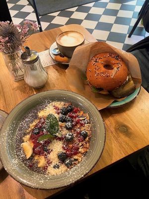 smoothie bowl, aubergine bagel at Datscha Bistro in Berlin