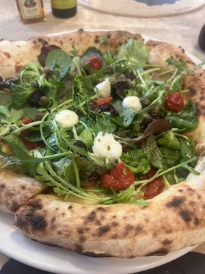 Vegan pizza closer image  at Sophia Loren in Florence