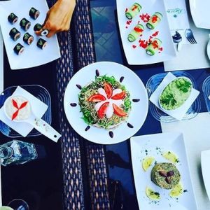 Almond sushi, raw pizza, raw zuchinni rolls and sunflower seeds paté, buckwheat cream, guacamole and mushroom terrine at Barca in Bucharest