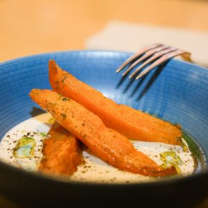 our famous roasted sweet potatoes with a comté sauce at Adam et Eve Cafe - Restaurant Végétarien in Paris