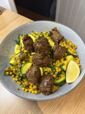 Sticky Harissa "Lamb" with Apricot & Fresh Mint Giant
Couscous  at Grubby in East London