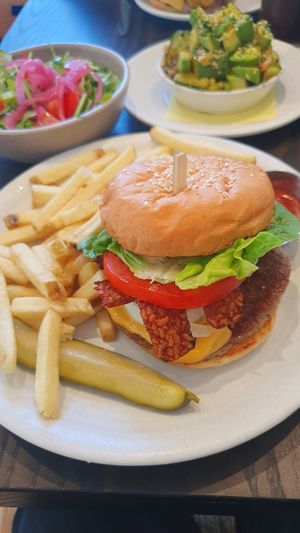 Burger with extra cheese and tempeh bacon at Rad Radish in San Francisco