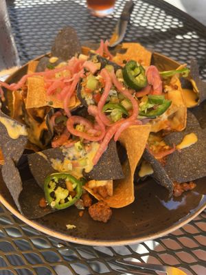 Beyond beef nachos with queso. (accidentally missing the black beans that are supposed to be a part of it)   at Sunspot in Knoxville