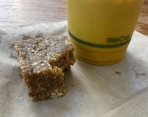 Iced golden latte and apricot slice  at Momo Wholefood in Newcastle
